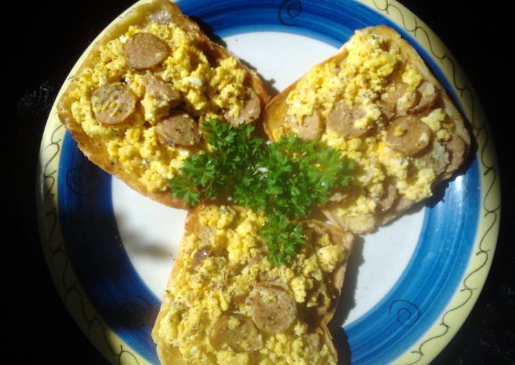 Ladybirds Saffron Scrambled Eggs with Sausage .