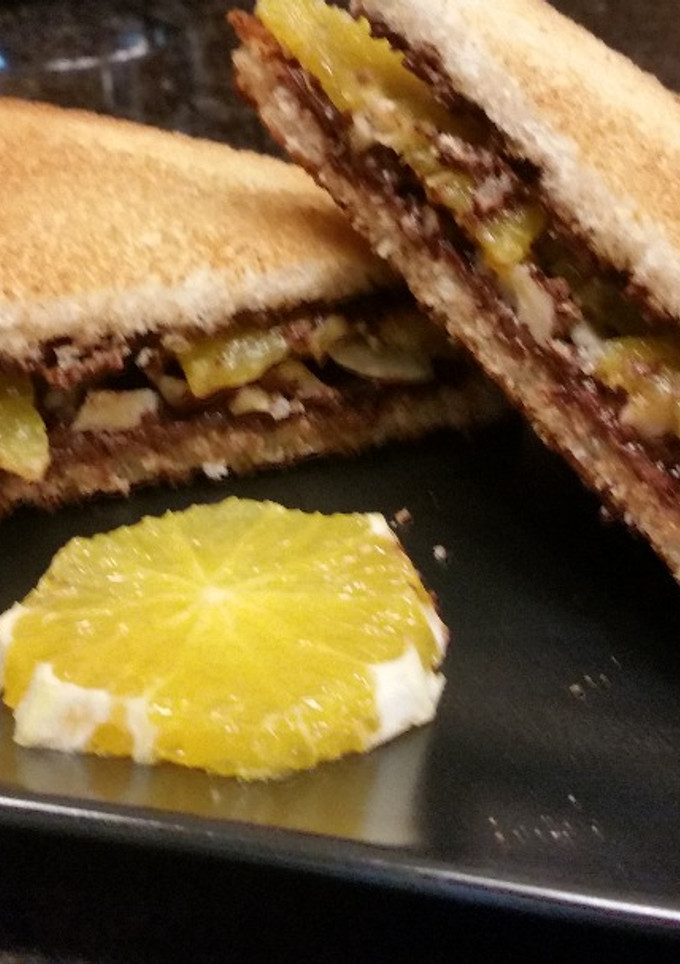 Una foto de Sándwich de Nocilla con naranja