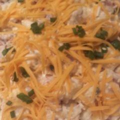A picture of Loaded gourmet style potato salad.