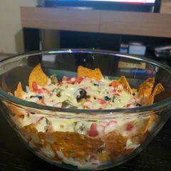 A picture of Cheesy nachos bowl.