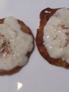 A picture of Malpua with kheer.