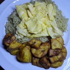 Buttered noodles with fluffy scrambled eggs & plantain A picture of Buttered noodles with fluffy scrambled eggs & plantain.
