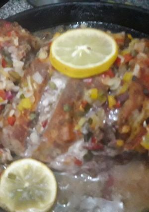 Una foto de Bondiolita al horno con papas rústicas