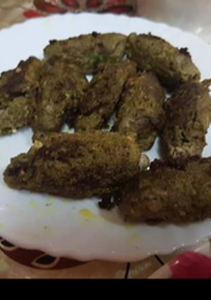 A picture of Mutton Seekh kebab in pan.