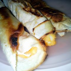 A picture of Alternative potato and cheese taquitos.