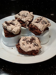 A picture of Fudge Brownies with Chocolate Peppermint Mousse Frosting.