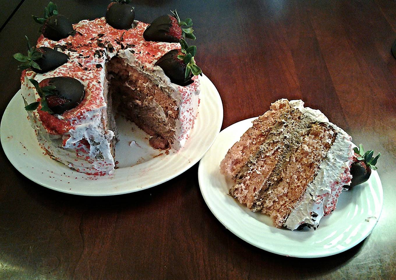Fresh strawberry cut chiffon cake with chocolate cream and strawberries