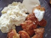 Una foto de alitas de pollo en sarten