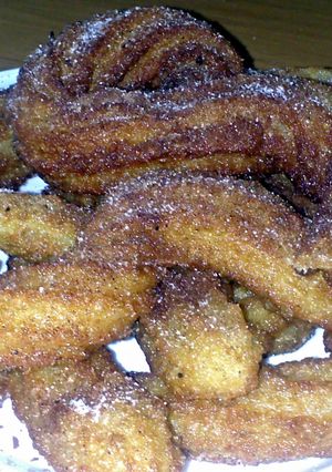 A picture of Sig's Churros with chocolate sauce.
