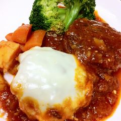 A picture of Light and Fluffy Tofu Hamburger Steaks Simmered in Sauce.