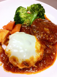 A picture of Light and Fluffy Tofu Hamburger Steaks Simmered in Sauce.