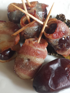 A picture of Dates and bacon.
