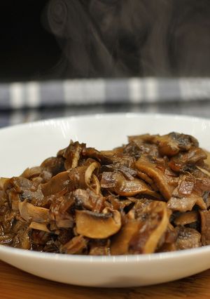 Foto principal de Champiñones encebollados en cerveza negra
