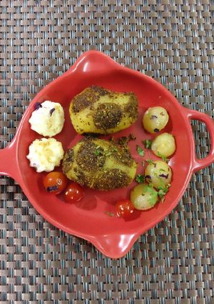 A picture of Different kind of spices in single potato.