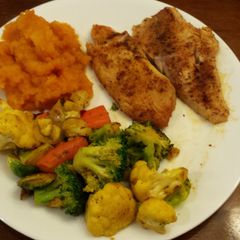 A picture of Tilapia W/Roasted Vegetables.