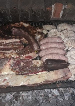 Una foto de Asado para mis amores