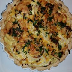A picture of Delicious Cheese Onion Tart.