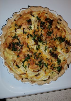 A picture of Delicious Cheese Onion Tart.