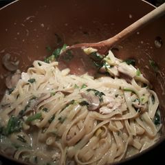 A picture of One pot spinach artichoke pasta with chicken.