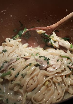 A picture of One pot spinach artichoke pasta with chicken.