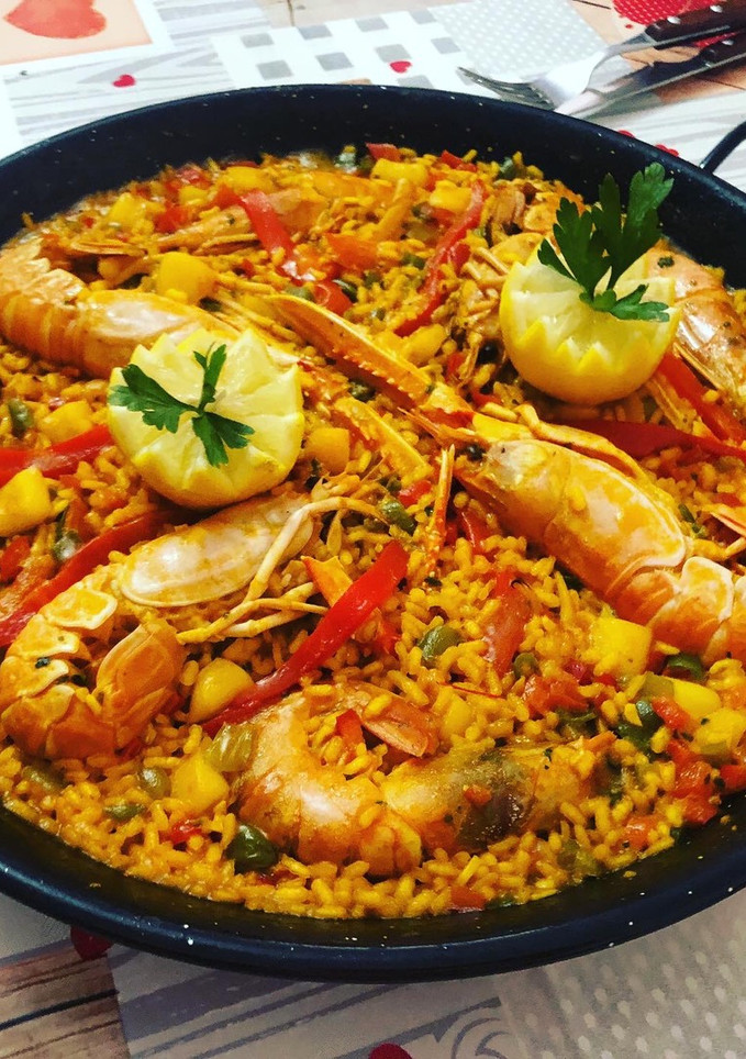 Una foto de Paella de cigalas y gambones