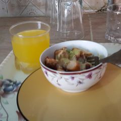 A picture of Cheesy sausage and kabab with orange juice.