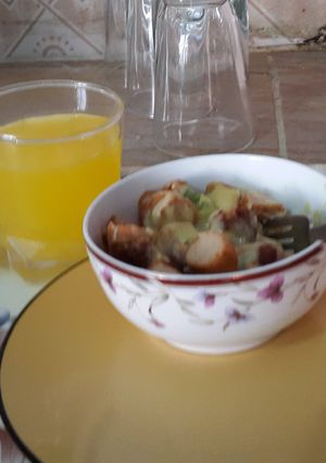 A picture of Cheesy sausage and kabab with orange juice.