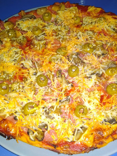 Una foto de Pizza casera clásica