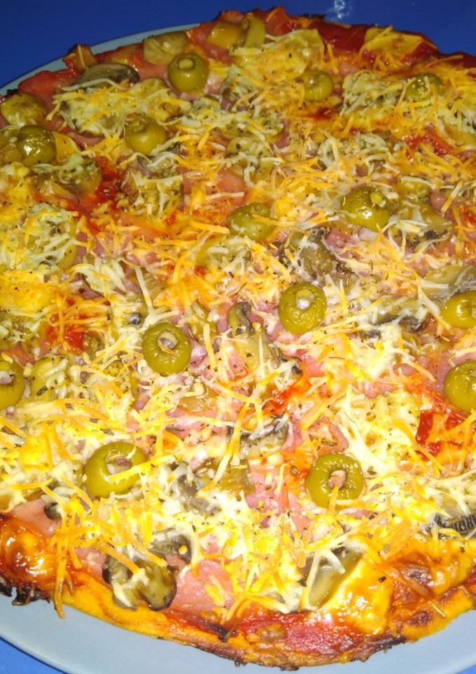 Una foto de Pizza casera clásica