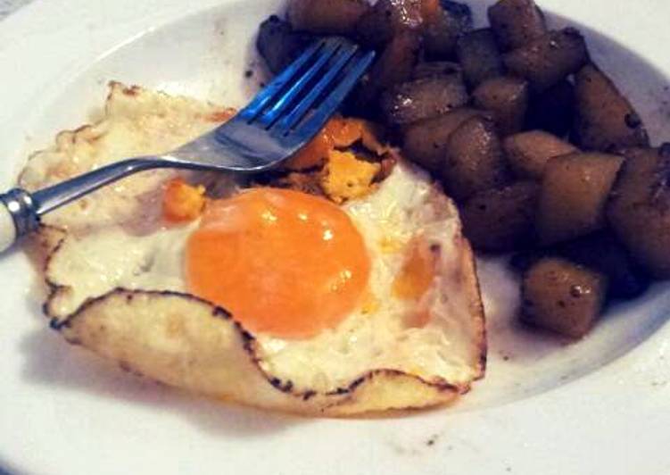 Spiced potatoes and sunnyside eggs
