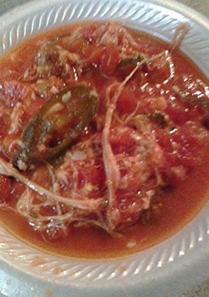 A picture of Spicy tomato sausage soup.