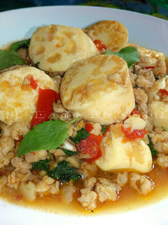 A picture of Stir-Fried Pork with Egg Tofu and Basil.