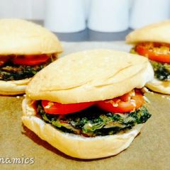 A picture of Spinach Burger with pork and beans.