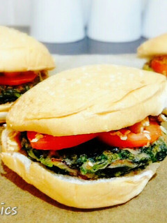 A picture of Spinach Burger with pork and beans.