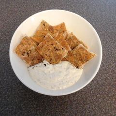 A picture of Homemade Crackers With A Homemade Dip.