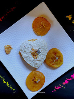 A picture of Thandai Phirni Cake with Malpua.