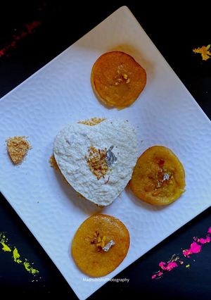 A picture of Thandai Phirni Cake with Malpua.