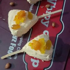 Eggless mango cake popsicles A picture of Eggless mango cake popsicles.