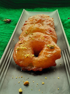 A picture of Green apple jalebi.