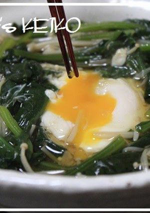 A picture of Soft-boiled Egg in a Spinach and Enoki Mushroom Nest.