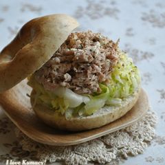 A picture of Bagel Sandwich Loaded with Cabbage and Tuna.