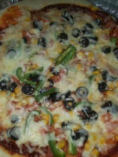 صورة لوصفة بيتزا بعجينة العشر دقائق