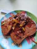 Chuleta con achiote y naranja