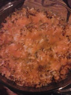 A picture of Cheesy chorizo Spanish rice bake.