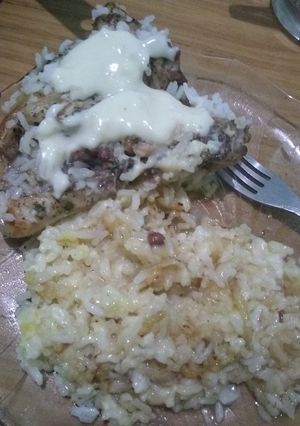 Una foto de Pollo con arroz al horno diferente
