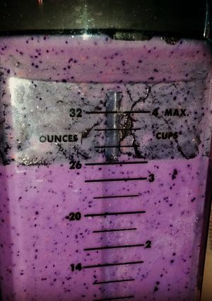 A picture of Pineapple banana blue/raspberry smoothie.