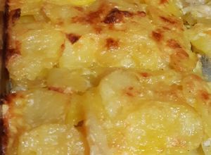 Una foto de Papas gratinadas 🤤