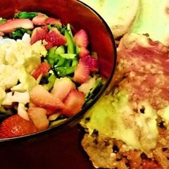 A picture of Chris's Lasagna strawberry spinach salad.