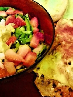 A picture of Chris's Lasagna strawberry spinach salad.