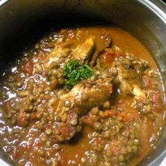 A picture of Chicken Wings Stewed in Tomato Sauce with Lentils.